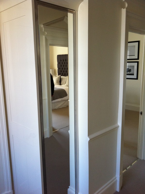 Full-length wardrobe mirror fitted in Winchmore Hill home
