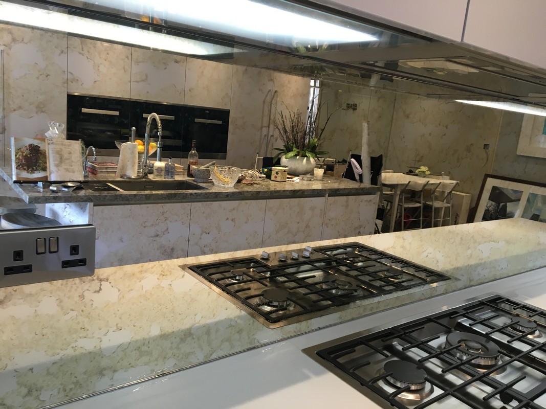 Mirror glass splashback in Winchmore Hill luxury kitchen
